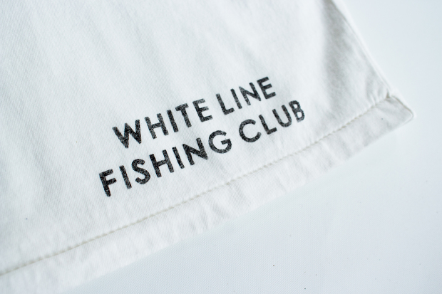 White line fishing clubのAbgarcia Pocket Tee