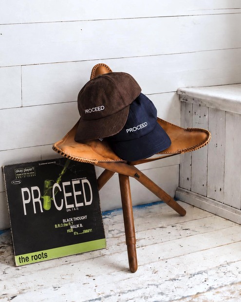 FOUND FEATHER STRAP BACK CAP PROCEED